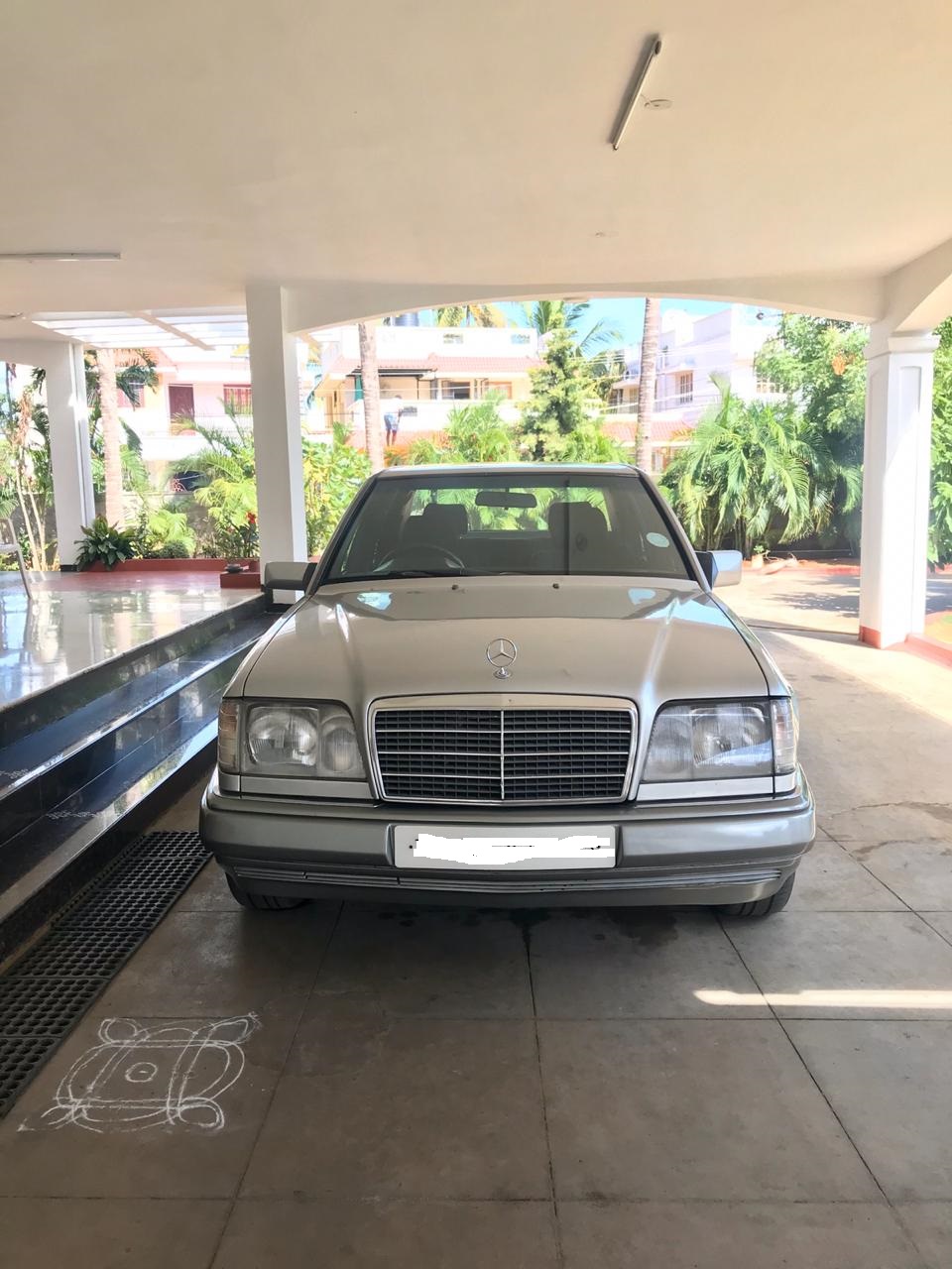 Mercedes W124 Diesel Fueling Up For The Long Haul - uy9gw4g